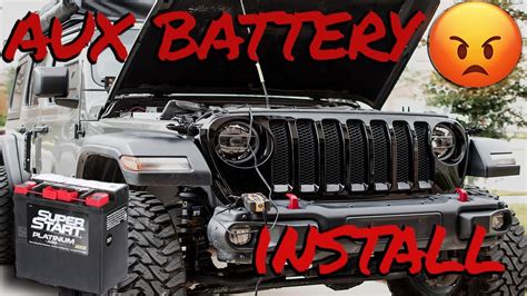 Reconnect the cable to the negative (-) terminal on the <strong>battery</strong>, then insert the. . 2020 jeep wrangler auxiliary battery location